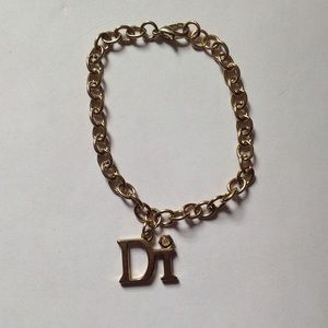 Di Gold Tone Caribbean Charm Bracelet 8"